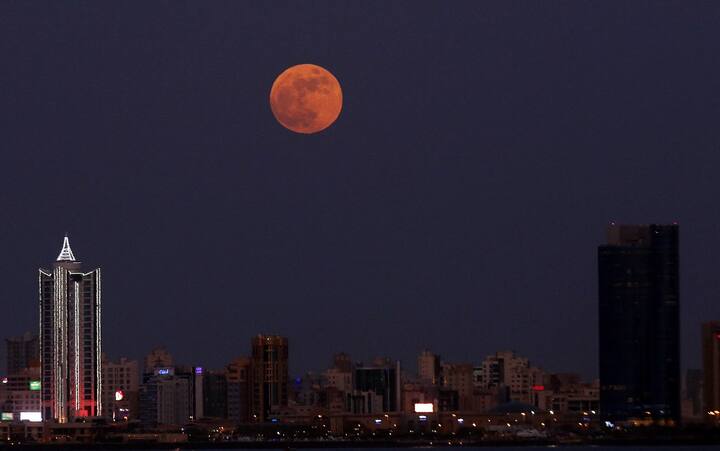 According to reports, the Strawberry Moon will appear from June 25, around midnight and will be visible for the next three days, till early Saturday morning. (Image: AFP)