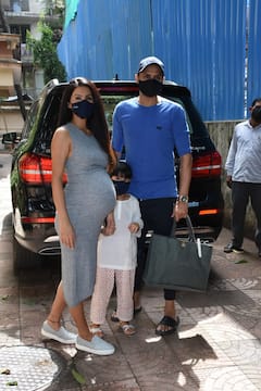 PICS: Mom-To-Be Geeta Basra Flaunts Baby Bump As She Steps Out With Husband Harbhajan Singh & Daughter