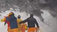 Joshimath: Devotees walk barefoot amid heavy snow storm