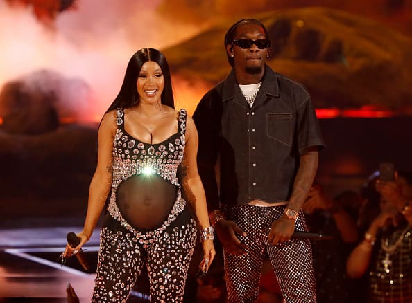 Cardi B with her husband Offset made the announcement through a joint performance at the BET Awards 2021, on Sunday. Cardi was decked out in a revealing outfit, showcasing her baby bump. [pic credit: Getty images]