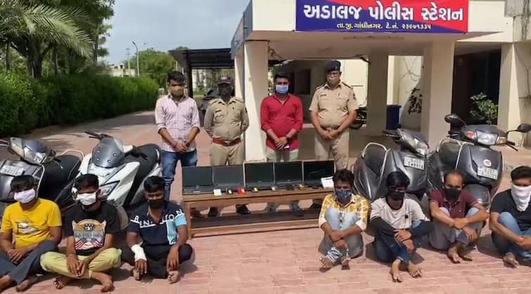 Call center seized from Gandhinagar Adalaj police station area ગાંધીનગર અડાલજ પોલીસ સ્ટેશન વિસ્તારમાંથી  કોલ સેન્ટર ઝડપાયું, 8 લોકો ચલાવતા ઈન્ટરનેશનલ કોલ સેન્ટર