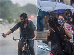 तस्वीरों में: दिल्ली में चिलचिलाती गर्मी के बीच हुई राहत की बारिश, लू से परेशान लोगों के चेहरे पर दिखी मुस्कान
