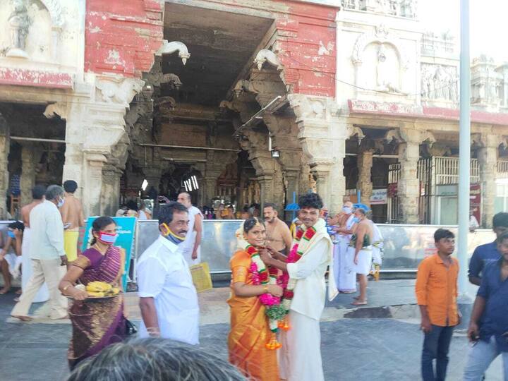 A couple getting married as wedding ceremonies are allowed in temples.