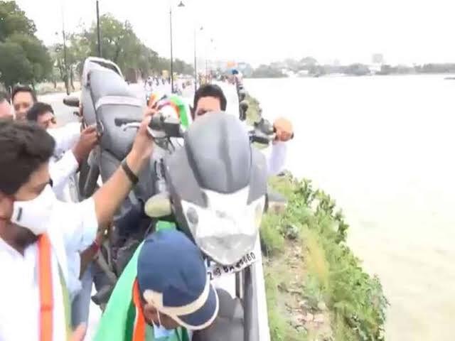 Telangana Minister KT Rama Rao Action Against Protestors Who Threw Bike LPG Cylinder Price Hike In Hussain Sagar Lake Telangana Minister KTR For Action Against Protestors Who Threw Bike, Cylinder In Hussain Sagar Lake