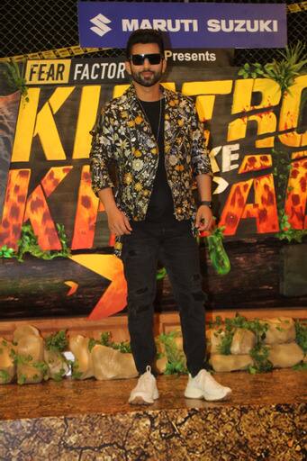 Rohit Shetty's 'Khatron K Khiladi 11' will hit the airwaves from next week on Colors channel. The makers of the show organised a press conference ahead of the premiere of 'KKK 11'. Bigg Boss 14's Rahul Vaidya, who will tie the knot next week, looked dapper in a black t-shirt and multi-colored coar.