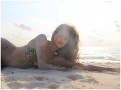 बिकिनी पहन रेत में लिपटी नजर आईं Disha Patani, कातिलाना अंदाज ने फैन्स को बनाया दीवाना