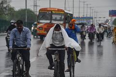 IN PIC | Heavy Rain On Tuesday Morning Brings Relief To Delhiites From Scorching Heat