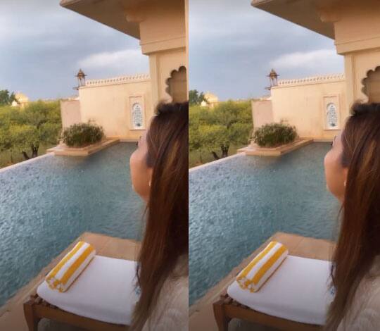 दिव्यांका और विवेक जैसे ही होटल पहुंचे तो वहां बारिश शुरू हो गई और दिव्यांका ने उदयपुर के इस खूबसूरत मौसम की झलक अपने इंस्टाग्राम पर दिखाई है. दिव्यांका और विवेद जिस आलीशान कमरे में ठहरे हैं उसमें प्राइवेट पूल भी है.  (फोटो - सोशल मीडिया)