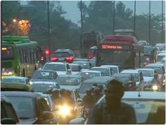 दिल्ली में बारिश से राहत लेकिन जाम बनी आफत, घंटों ट्रैफिक में फंसे रहे लोग- देखें तस्वीरें