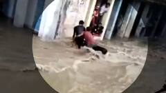 Bike washes away with strong gush of water in Rajasthan's Sikar