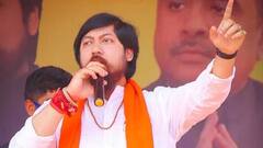 শিরোনাম: 'বিদেশি' স্বরাষ্ট্র-প্রতিমন্ত্রী? তুঙ্গে বিতর্ক