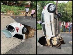 आफत की बारिश: सड़क के गड्ढ़े में धंसी पूरी कार, सिर्फ एक दिन की बारिश से बेहाल हुई दिल्ली