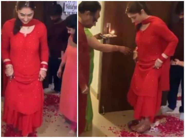 New bride Disha Parmar entered the house wearing a red suit  video went viral रीति-रिवाजों के साथ Disha Parmar ने पति Rahul Vaidya के साथ गृह प्रवेश, लाल सूट और हाथों में चूड़ा पहने दिखीं बला की खूबसूरत