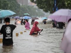 China Flood: 12 Killed In Zhengzhou, Several Trapped In Chest-Deep Water Inside Subway