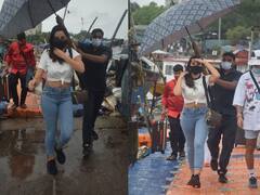 डिजाइनर छतरी के नीचे दो लाख का पर्स लिए टीशर्ट को फोल्ड कर कहां निकलीं Nora Fatehi?