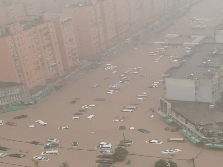 China flood heaviest rain in 1000 years resulting in devastating floods China flood: হাজার বছরের রেকর্ড ভেঙে প্রবল বন্যা চিনে, উদ্ধার কাজে মোতায়েন সেনা