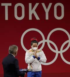 Mirabai Chanu pics: ইম্ফলের রুপোর মেয়ে, টোকিওয় চানুর হাত ধরেই সূর্যোদয় ভারতের