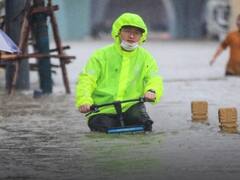 China Rains | சீன வெள்ளத்தின் கோர முகத்தைக் காட்டும் புகைப்படங்கள்!