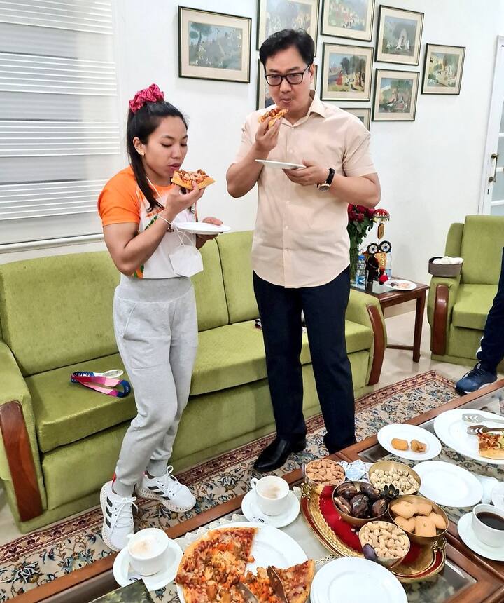 For the past few months, the 26-year-old champion weightlifter has been on a strict diet ahead of the showpiece event. After winning the silver medal, in an interview given Mirabai said, I haven’t even eaten a pizza in a long time. Photo: @KirenRijiju / Twitter