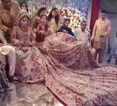ਵਿਆਹ 'ਤੇ ਦੁਲਹਨ ਨੇ ਪਹਿਨਿਆ 100 ਕਿੱਲੋ ਦਾ ਲਹਿੰਗਾ, ਸੋਸ਼ਲ ਮੀਡੀਆ 'ਤੇ ਬਣਿਆ ਚਰਚਾ ਦਾ ਵਿਸ਼ਾ