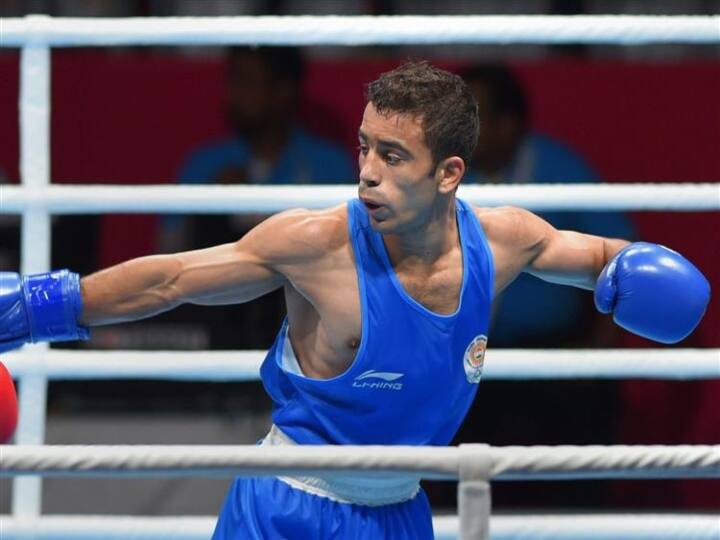 Tokyo Olympics: 52kg Men's category Indian Boxer Amit Panghal loses to Columbia's Boxer and bows out Tokyo Olympics: ஒலிம்பிக் குத்துச்சண்டை போட்டியில் அமித் பங்கால் ஏமாற்றம் !