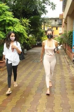 IN PICS: Malaika Arora Flaunts Her Toned Physique In A Beige Coloured Gym Wear