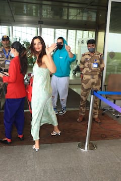 IN PICS: Jasmin Bhasin Looks Stunning In A Slip Dress At The Airport With Boyfriend Aly Goni; Lovebirds Make A Stylish Couple