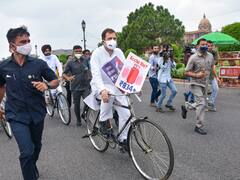 विपक्षी दलों के साथ 'ब्रेकफास्ट' बैठक के बाद साइकिल पर सवार होकर संसद पहुंचे राहुल गांधी, तस्वीरों में देखें