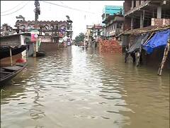 West Bengal Flood Photos জলে ভেসে গিয়েছে বাড়িঘর, বৃষ্টি কমলেও কমেনি যন্ত্রণা, জেলায় জেলায় দুর্ভোগের ছবি