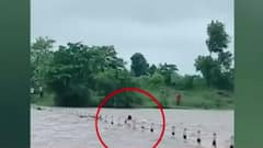 When a Vidisha man got stuck on a submerged bridge amid violent gush of water