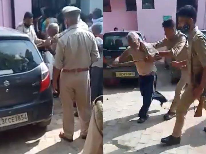 police constable gets suspended on beating up a retired captain who went for vaccination in Kannauj ANN वर्दी की हनक, वैक्सीन लगवाने गए रिटायर्ड कैप्टन को पुलिस ने सरेआम पीटा, सिपाही सस्पेंड