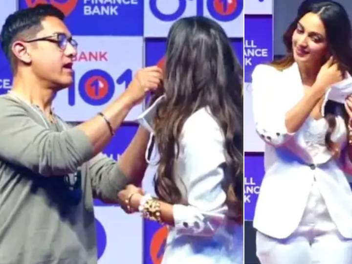 Video: भरी महफिल में मास्क से परेशान हुई कियारा आडवाणी, आमिर खान ने यूं की मदद Aamir Khan Kiara Advani struggle to remove her stuck mask at event video viral Video: भरी महफिल में मास्क से परेशान हुई कियारा आडवाणी, आमिर खान ने यूं की मदद