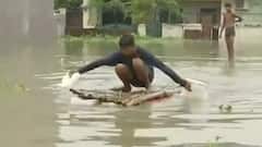 Boat rides, washed away houses, water-logged streets and troubled UP: Ground Visuals