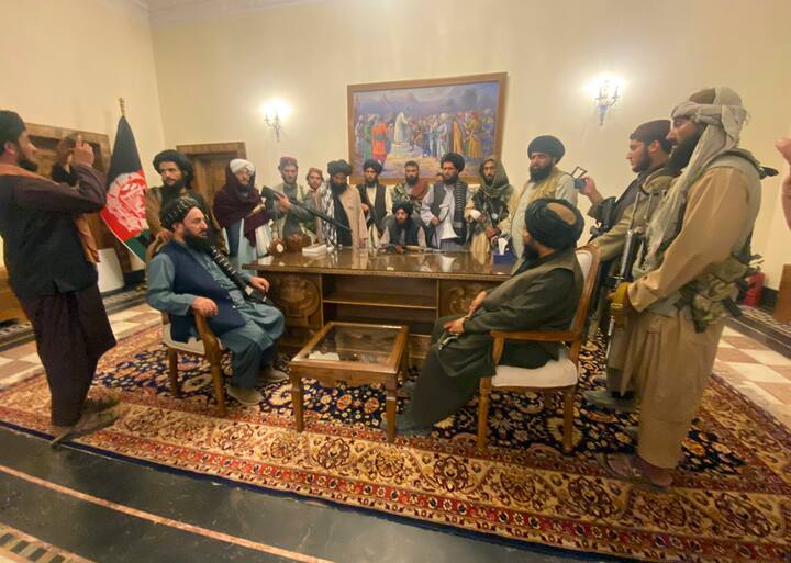 Taliban fighters take control of Afghan presidential palace after the Afghan President Ashraf Ghani fled the country, in Kabul, Afghanistan on August 15, 2021. (Image Source: AP/Zabi Karimi)
