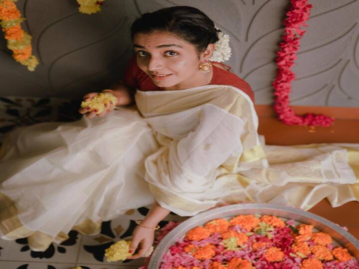 என்னை கிள்ளி கிள்ளி பூக்க வைத்தானே