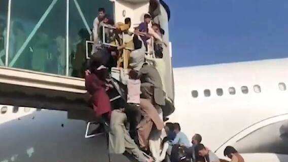 Caught on camera: Shocking visuals of Afghans hanging on to tyres of plane leaving Kabul
