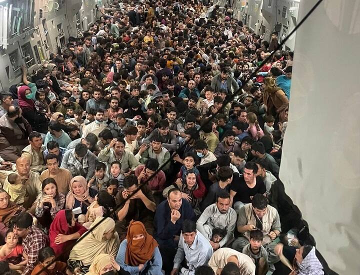 Inside Images 871 US C-17 Packed 640 Afghans Escape Taliban Air Force evacuation flight Kabul to Qatar Afghanistan viral video Shocking Image Shows Over 600 Afghans Packed In US Cargo Plane Escaping Taliban Rule