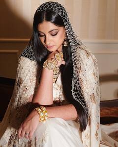 IN PICS | Rhea Kapoor Is A Classy Bride In This Abu Jani Sandeep Khosla Couture