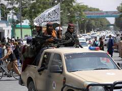 Afghanistan Crisis Photos: अफगानिस्तान के कई शहरों में प्रदर्शन, तालीबान ने की बर्बरता