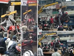 पुण्यात वाहनासकट दुचाकीस्वाराला टोईंग व्हॅनमध्ये भरलं!  नो पार्किंगमधील वाहनांवर कारवाई करण्याची ही कुठली पद्धत?