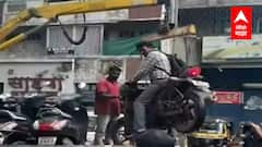 Pune : वाहनासकट दुचाकीस्वाराला टोईंग व्हॅनमध्ये भरलं! पुण्यात वाहतूक पोलिसांची कारवाई