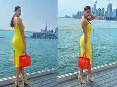 पीली ड्रेस, लाल पर्स... बन-ठनकर घर से निकलीं बेपनाह खूबसूरती की मलिका Nora Fatehi, लूट लिया चैन और करार