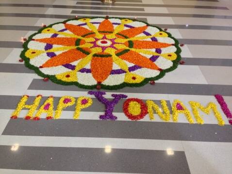 The floral Rangoli, known as Onapookkalam, Athapookkalam or just Pookkalam is made with fresh flowers and flower petals particularly at entrances and temple premises like a flower mat. Image Source: Getty