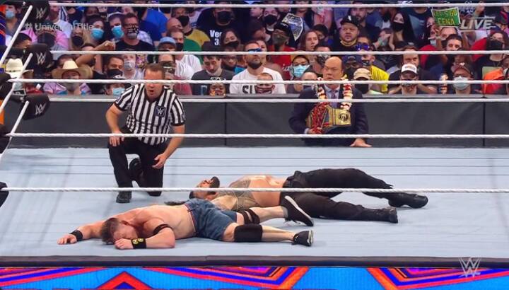 Summerslam 2021 highlights: WWE's Roman reigns defeats john cena WWE Summerslam 2021: ஜான் சீனா vs ரோமன் ரெயின்ஸ்: 17வது சாம்பியன்ஷிப்பை மிஸ் செய்த சீனா!