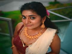 Actress Nimisha Bindu pics | இன்னும் கொஞ்சம் காலம் பொறுத்தா தான் என்ன - நிமிஷ பிந்து சஜயன் போட்டோஷூட்