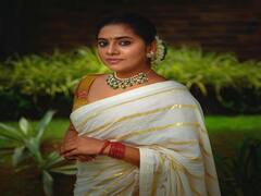 Actress Nimisha Bindu pics | இன்னும் கொஞ்சம் காலம் பொறுத்தா தான் என்ன - நிமிஷ பிந்து சஜயன் போட்டோஷூட்
