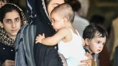 Afghanistan: কোথাও শিশুকে দুধ খাওয়াচ্ছে মা, কোথাও একরত্তি বোনকে আদর, আফগানিস্তান থেকে ভারতে ফিরে স্বস্তির নিঃশ্বাস | Bangla News