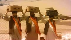 Afghani Sikhs leave all during evacuation, to bring holy Guru Granth Sahib with them
