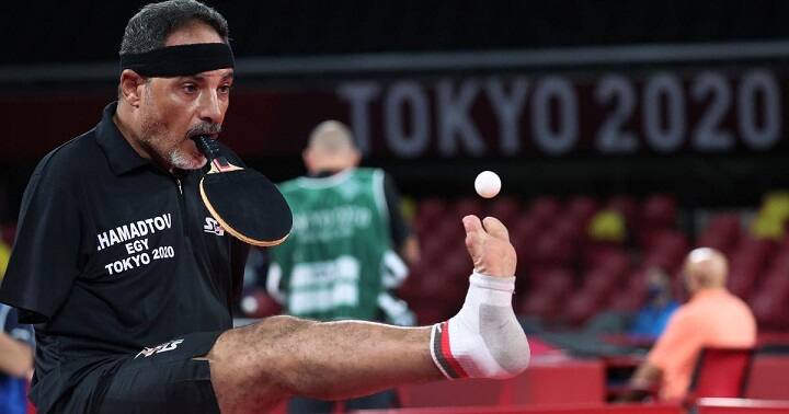Tokyo Paralympics 2021, Meet Ibrahim Hamadtou, Egyptian who plays table tennis with mouth Tokyo Paralympics 2021: வாழ பிடிக்காதவர்கள் இவரை பார்த்து வாழ கற்றுக்கொள்ளுங்கள்! 48 வயதில் பாரலிம்பிக் விளையாடும் இப்ராஹிம்!