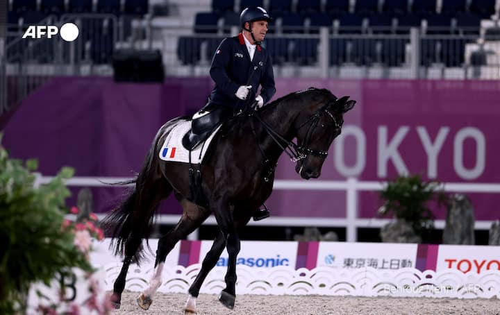 France's Vladimir Vinchon riding Fidertanz For Rosi competes in the equestrian dressage individual test grade IV during the Tokyo 2020 Paralympic Games at Equestrian Park in Tokyo. (Image: AFP)